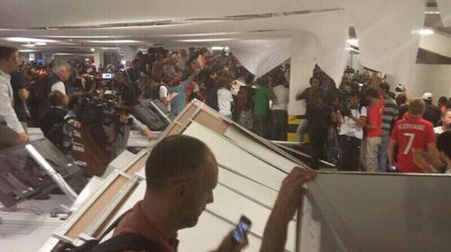 Hundreds of Chile fans storm stadium in Rio