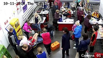 Customers continued shopping as the woman gave birth to a boy.