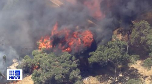 Fresh emergency warnings issued over Perth fires after homes flattened in minutes