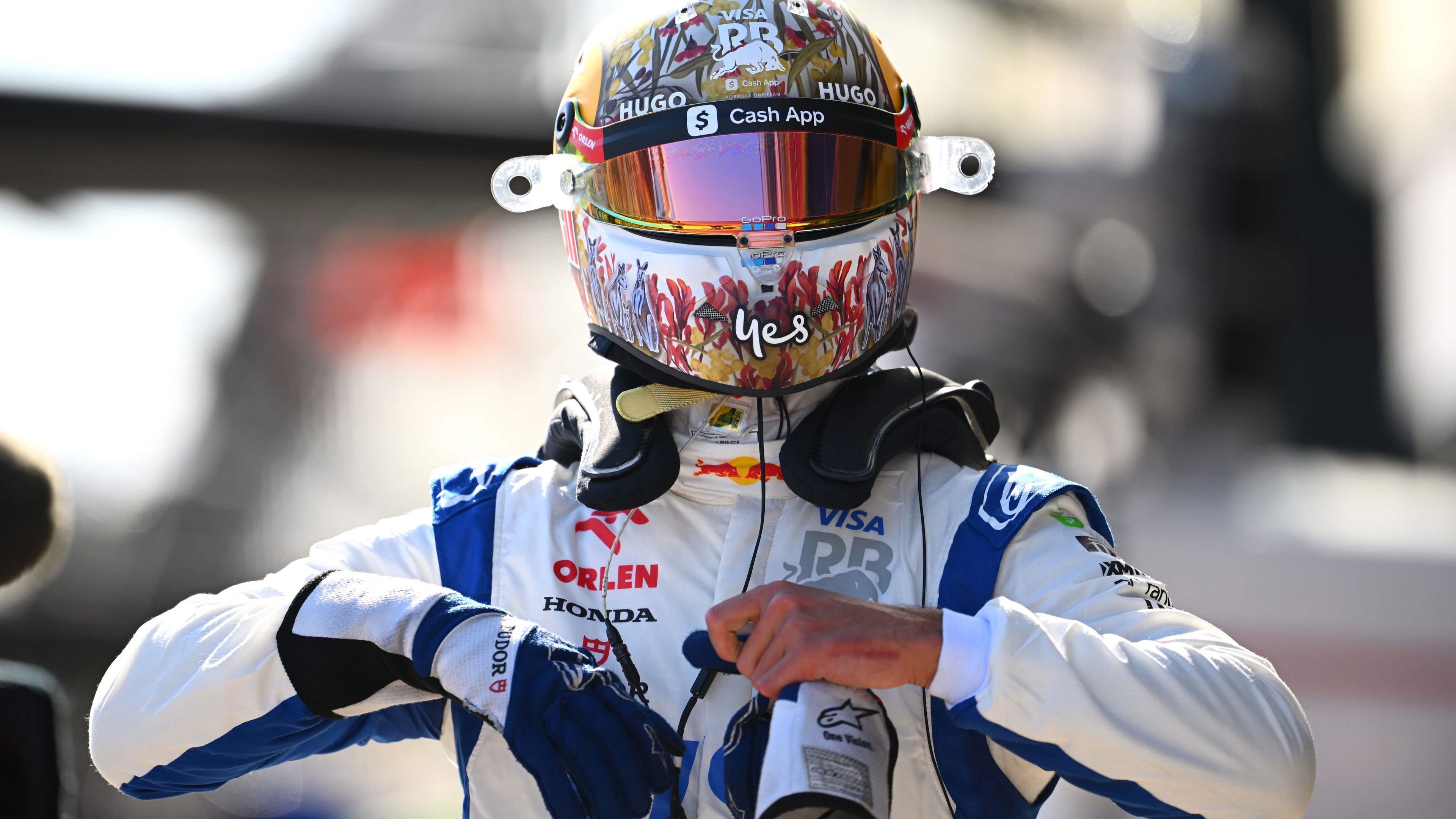 Daniel Ricciardo of Australia and Visa Cash App RB walks in the Pitlane during qualifying ahead of the F1 Grand Prix of Australia at Albert Park Circuit on March 23, 2024 in Melbourne, Australia. (Photo by Clive Mason - Formula 1/Formula 1 via Getty Images)