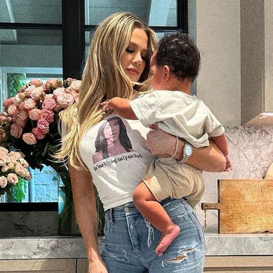 Khloe Kardashian wears Kim Kardashian "work" quote on a t-shirt