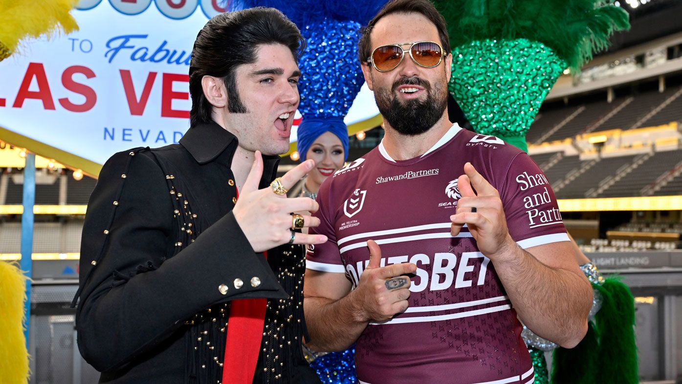 Manly&#x27;s Aaron Woods poses with an Elvis impersonator in Las Vegas.