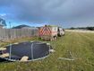 Trampoline found in paddock as storm clean-up begins