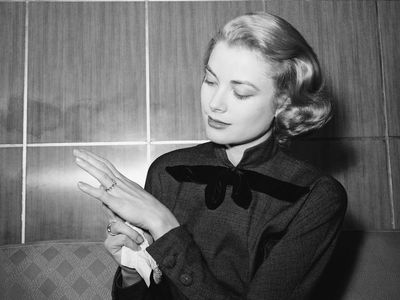 Grace shows off her first engagement ring, 1956
