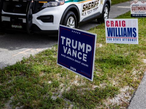 Campaign signs for Trump-Vance are seen outside the Palm Beach County Supervisor of Elections on August 14, 2024, in West Palm Beach, Florida.