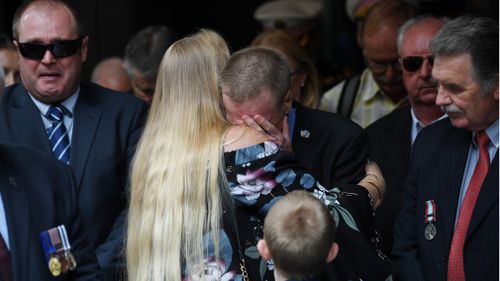 Emotions were high during the procession in the Sydney CBD (AAP).