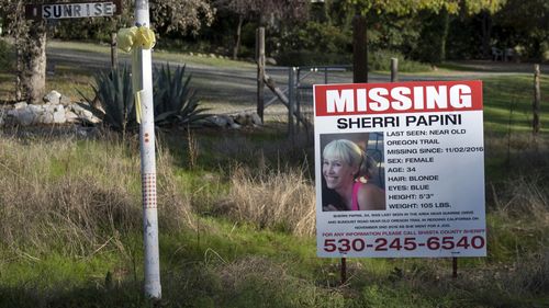 In this Nov. 10, 2016, file photo, a "missing" sign for Mountain Gate, Calif., resident Sherri Papini, is seen along Sunrise Drive, near the location where the mom of two is believed to have gone missing while on an afternoon jog