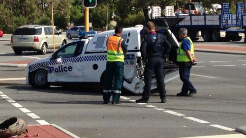 Police dog squad car T-boned at intersection in Perth