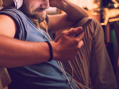 Close up of a man using a phone