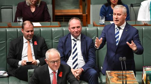 Prime Minister Malcolm Turnbull and then-Minister for Small Business Michael McCormack during Question Time in the House of Representatives at Parliament House in Canberra in October, 2017. (AAP)