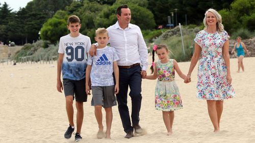 Mark McGowan on Rockingham Beach with wife Sarah and children Samuel (13), Alexander (11) and Amelkia (7) pictured in 2017
