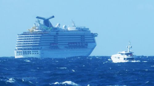 Cruise ship rescues 2 from superyacht