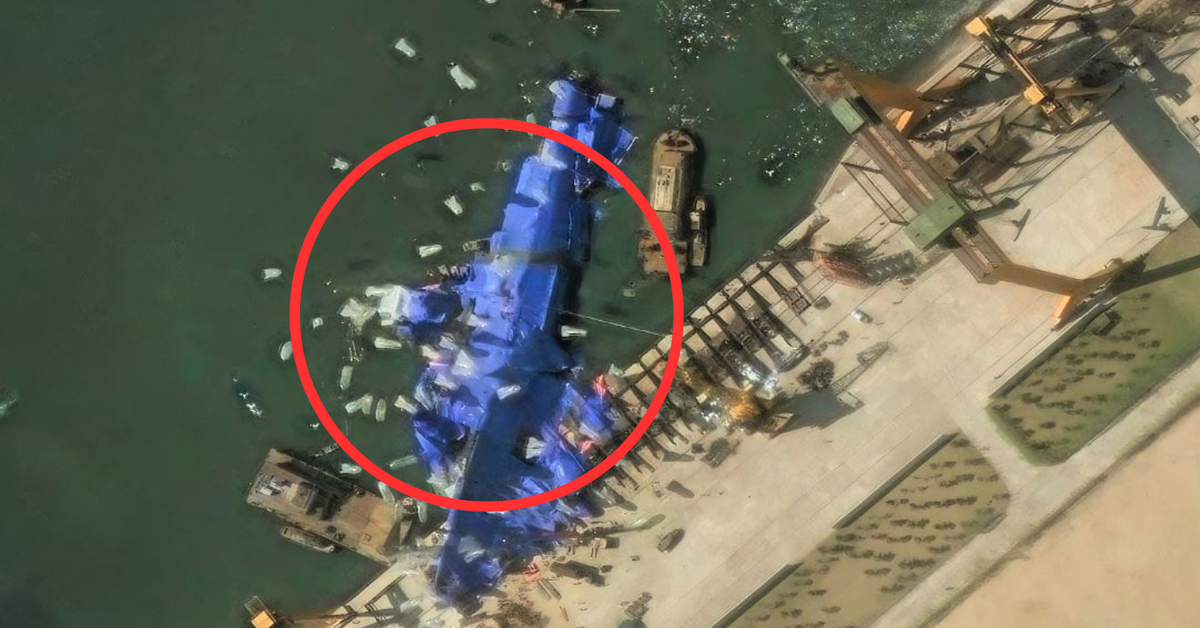 Mystery 'balloons' swarm stricken North Korean warship