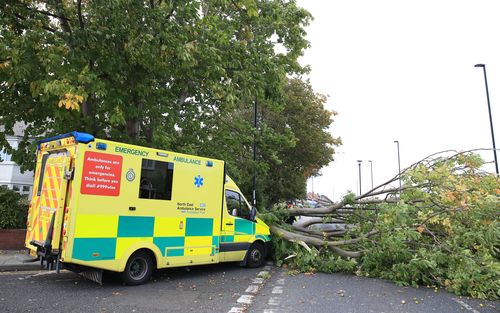 An ambulance which crashed into a fallen tree in Newcastle.