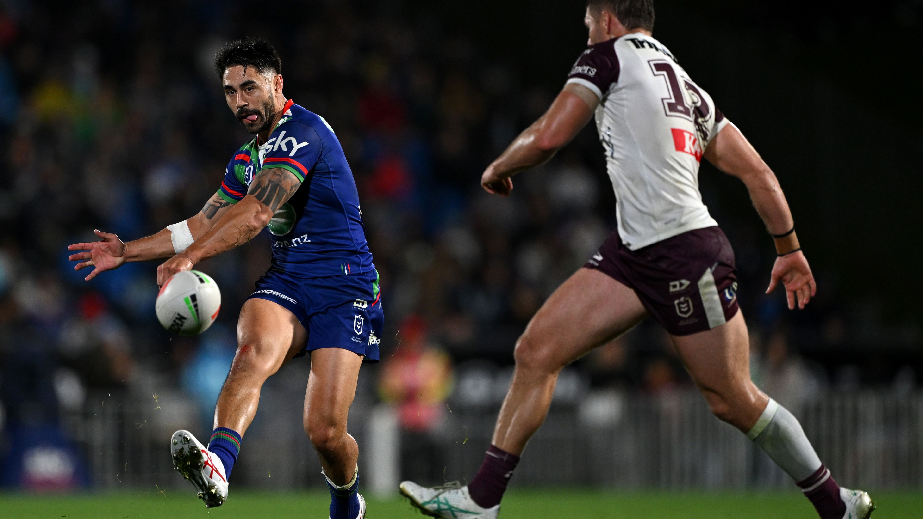 Shaun Johnson kicks the ball through during the round six NRL match between the Warriors and the Manly Sea Eagles.