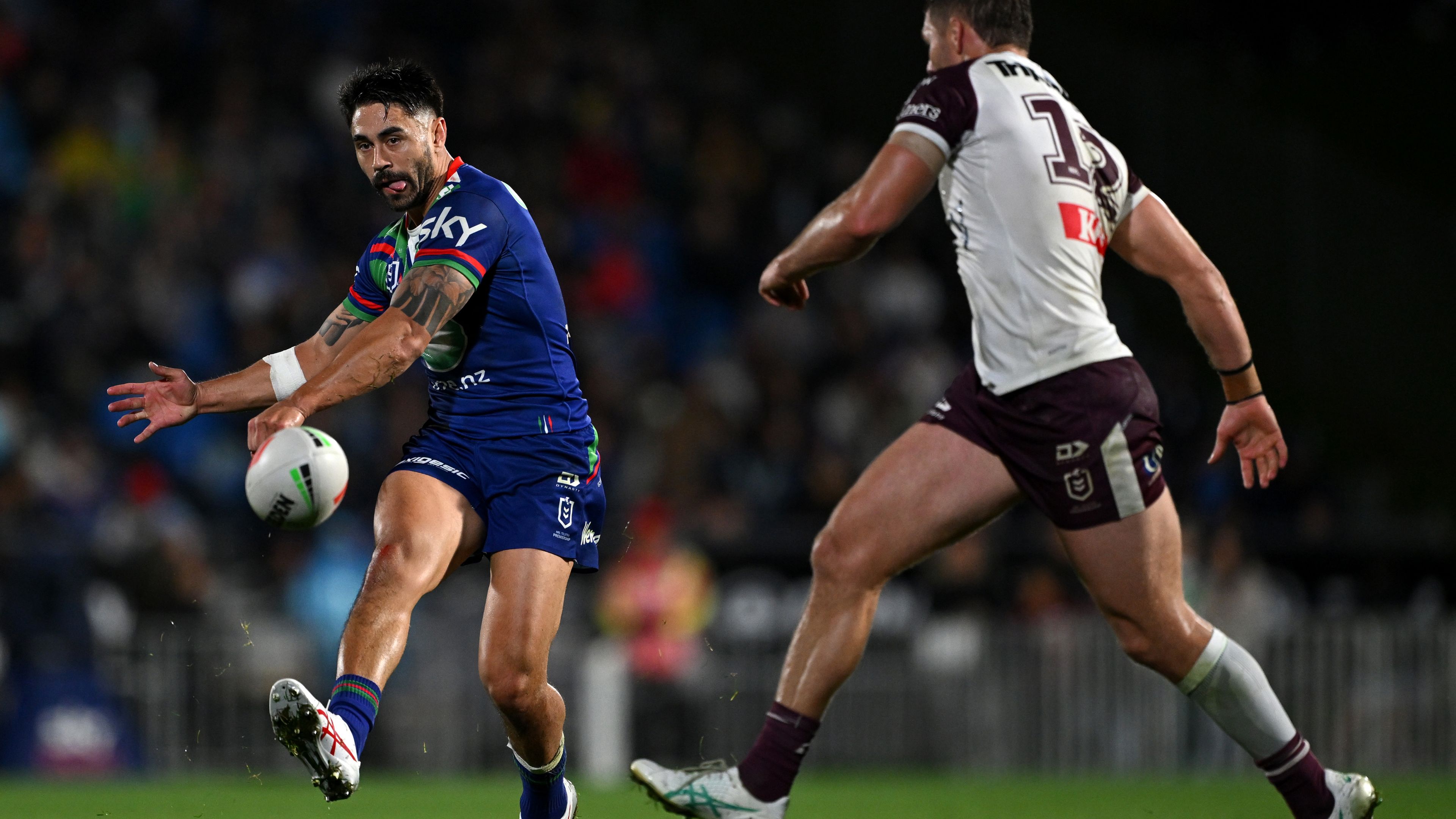 Shaun Johnson kicks the ball through during the round six NRL match between the Warriors and the Manly Sea Eagles.