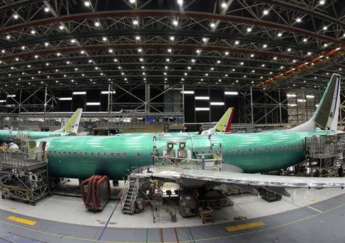 A Boeing 737 MAX 8 airplane is shown on the assembly line during a brief media tour in Boeing's 737 assembly facility, in Renton, Washington. Aviation authorities around the world grounded the plane in March after two fatal crashes.
