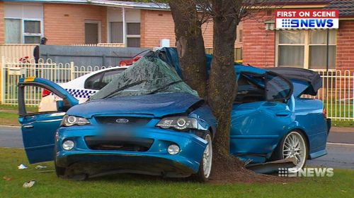 A 23-year-old woman has survived after she crashed in Adelaide, wrapping her car around a tree. Picture: 9NEWS