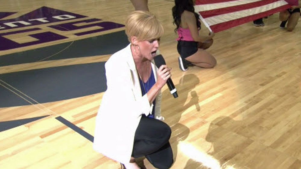 NBA: Singer kneels in protest during national anthem