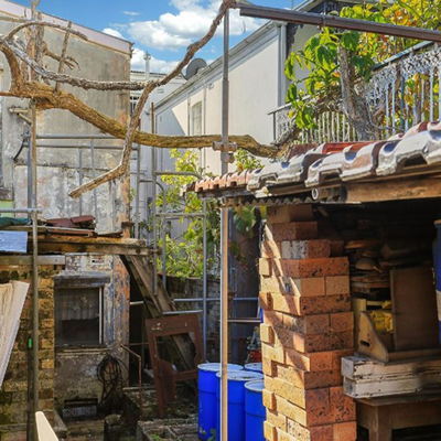 Former hoarder's house in Sydney sells at auction for $3.85 million