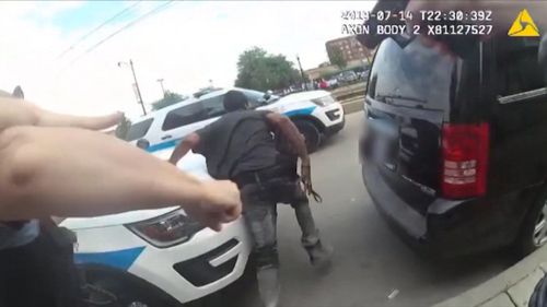 In the police bodycam vision, Augustus can be seen flailing away from police before his shirt is raised. Picture: CNN.