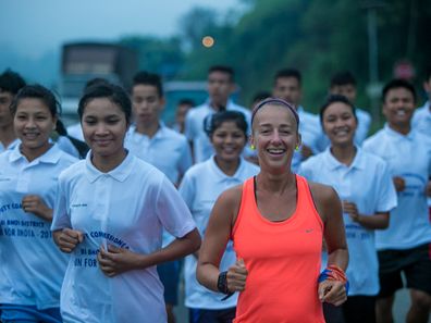 Samantha with a team of runners.