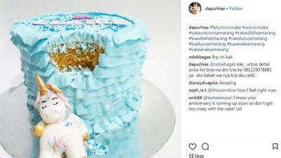 Baby unicorn accompanies baby blue cake