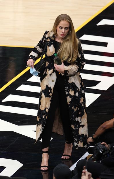 Singer Adele looks walks in during the second half in Game Five of the NBA Finals between the Milwaukee Bucks and the Phoenix Suns at Footprint Center on July 17, 2021 in Phoenix, Arizona. 