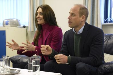 Kate, Princess of Wales, and Prince William speak to members of staff as they visit Windsor Foodshare in Windsor, Thursday, Jan. 26, 2023. 