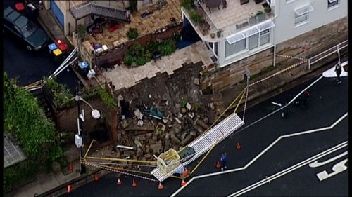 The heavy rain has also caused a landslip at Bronte. (9NEWS)