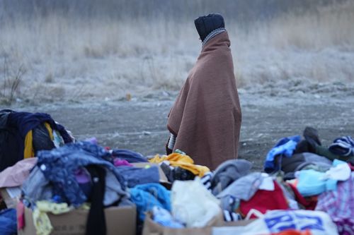 A refugee fleeing conflict in Ukraine arrives to Przemysl, Poland, Sunday, Feb. 27, 2022. 