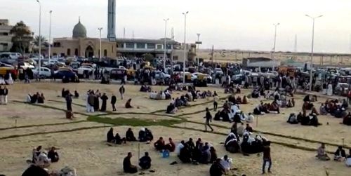 A grab taken from a video showing people gathering outside the mosque in Sinai. (AAP)