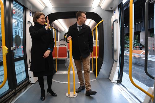 Premier Gladys Berejiklian and Minister for Transport Andrew Constance ride on the first light rail vehicle test from Town Hall to Circular Quay in Sydney.