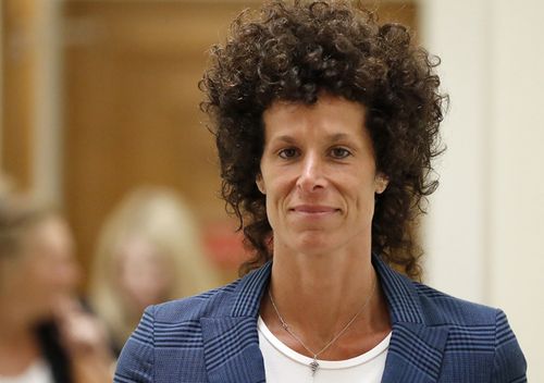 Andrea Constand walks to the courtroom for Bill Cosby's sexual assault trial at the Montgomery County Courthouse in Norristown, Pennsylvania