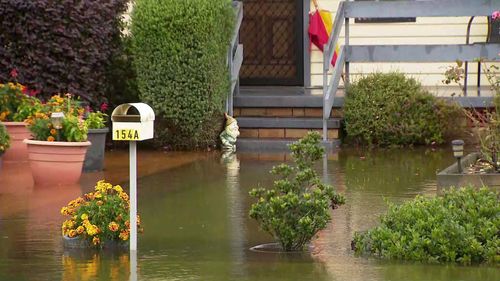 In Lake Macquarie, waters are rising around homes in Dora Creek with more than 120 millimetres of rain recorded at Port Macquarie since 9am.