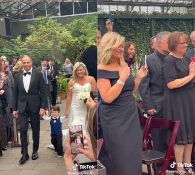 Little boy walks mum down the isle. 