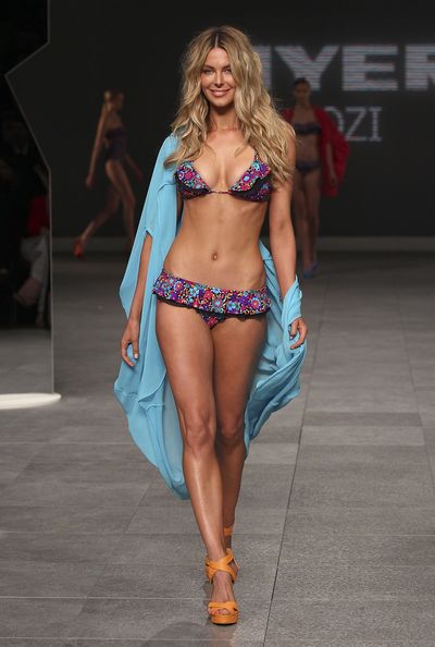Jennifer Hawkins wearing one of her own Cozi designs for Myer's Spring/Summer launch during Mercedes Benz Fashion Festival in Sydney, August, 2011