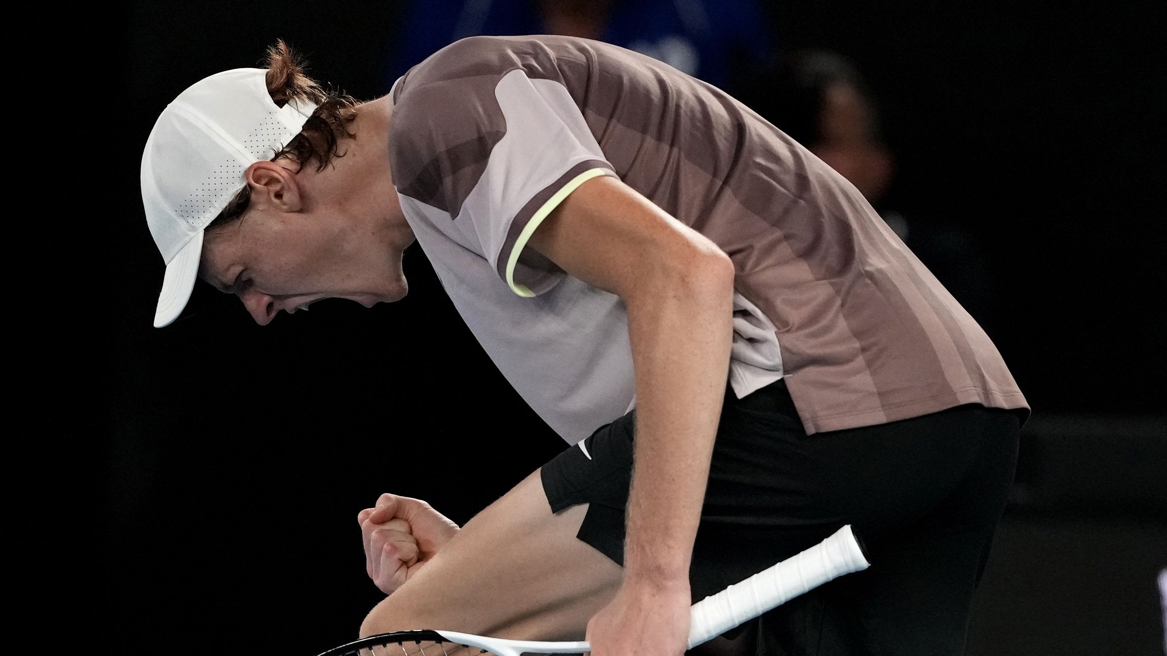 Jannik Sinner of Italy reacts after winning the second set against Andrey Rublev of Russia during their quarter-final match at the Australian Open.