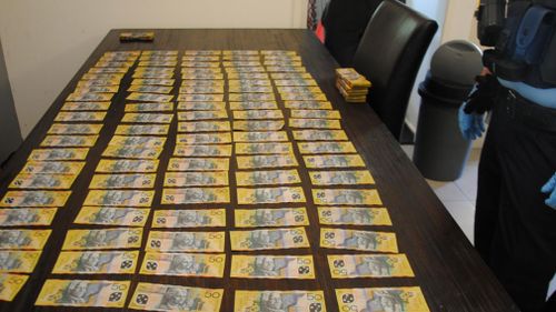 $36,000 in cash was seized. (AFP)