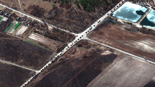 Dramatic satellite images released by Maxar Technologies showed a massive 60+ kilometre long convoy of Russian military vehicles snaking along roadways northwest of Kyiv. 