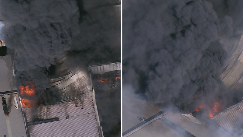 Massive factory fire still burning as crews worked overnight | Nine.com.au