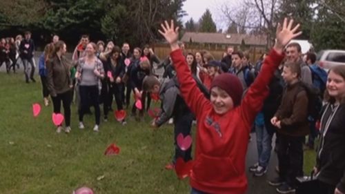 The youths decorated her lawn with heart-shaped cards. (CHEK NEWS)