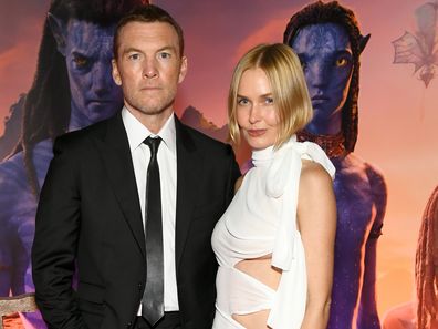 Sam Worthington and Lara Worthington attend the world premiere of 20th Century Studios "Avatar: Fire and Ash"