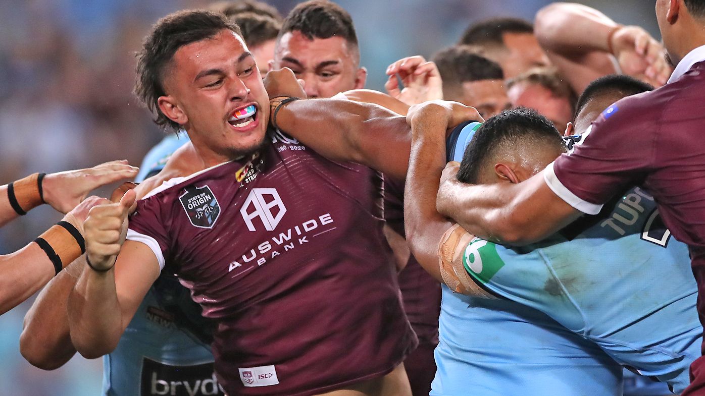 Tino Fa&#x27;asuamaleaui of the Maroons and Payne Haas of the Blues scuffle 