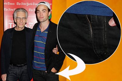 As if he didn't feel exposed enough already, poor R-Pattz must have been so distracted by the heartache caused by his cheating girlfriend Kristen Stewart, he forgot to check his fly before posing at the premiere of his movie <i>Cosmopolis</i>.