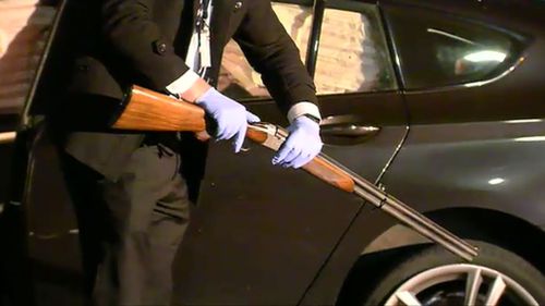 Police found a gun on the passenger seat. (9NEWS)