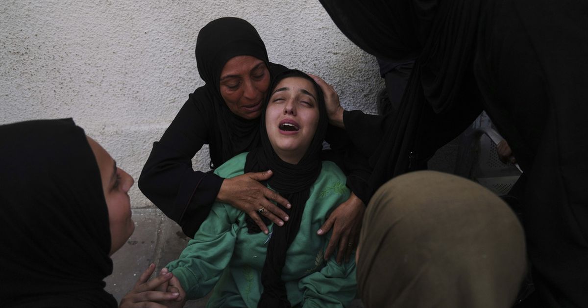 Israeli strikes kill dozens in school-turned-shelter, medics say