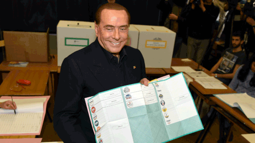 Silvio Berlusconi completed his ballot in the Italian election at a Milan polling station on Sunday, March 4. (AAP)