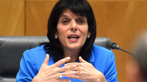 Julia Banks speaks to ANZ CEO Shayne Elliott during the House of Representatives Standing Committee on Economics annual public hearing at Parliament House.