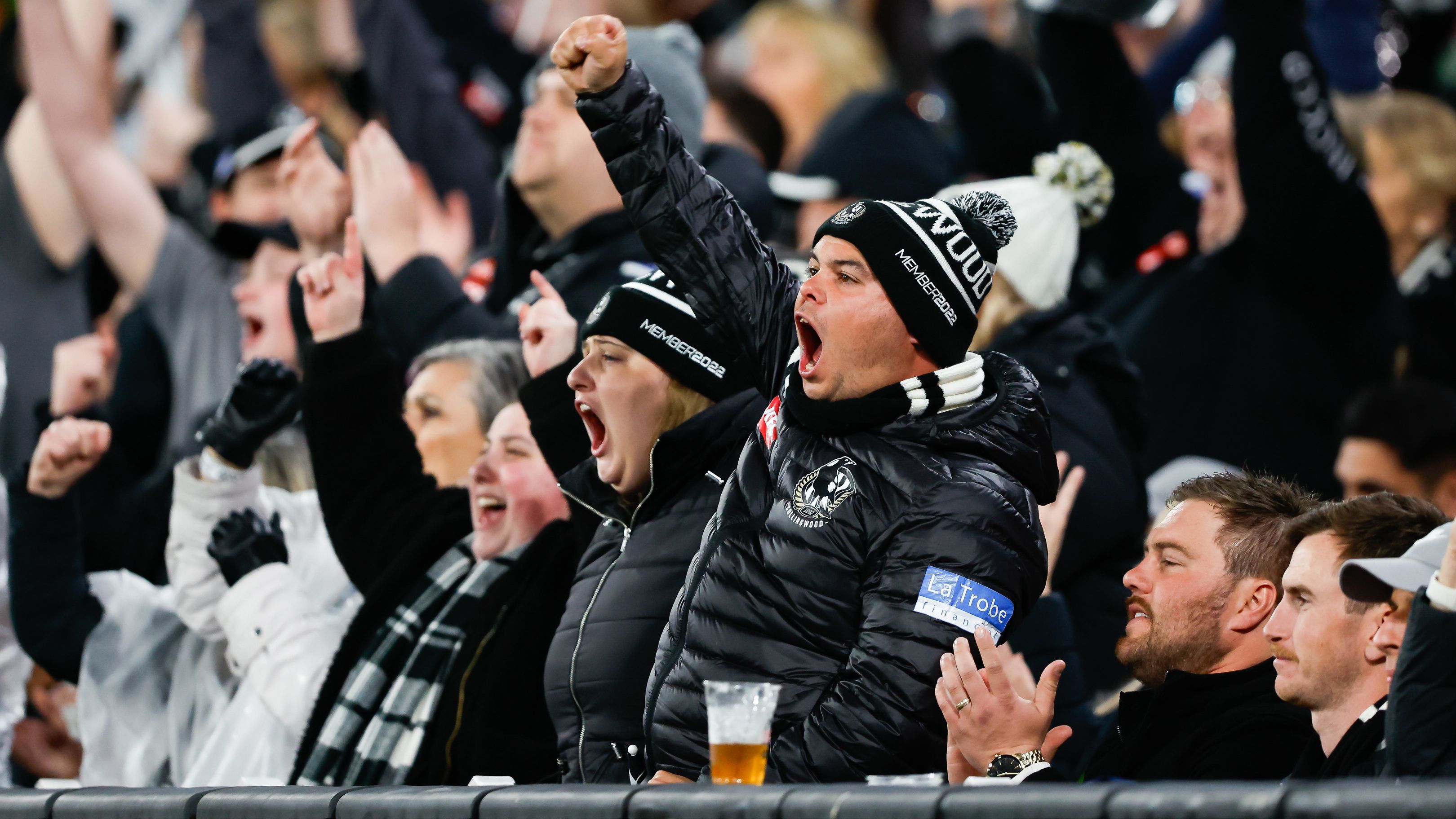 MELBOURNE, AUSTRALIA - SEPTEMBER 07: Collingwood fans celebrate during the 2023 AFL First Qualifying Final match between the Collingwood Magpies and the Melbourne Demons at Melbourne Cricket Ground on September 07, 2023 in Melbourne, Australia. (Photo by Dylan Burns/AFL Photos via Getty Images)